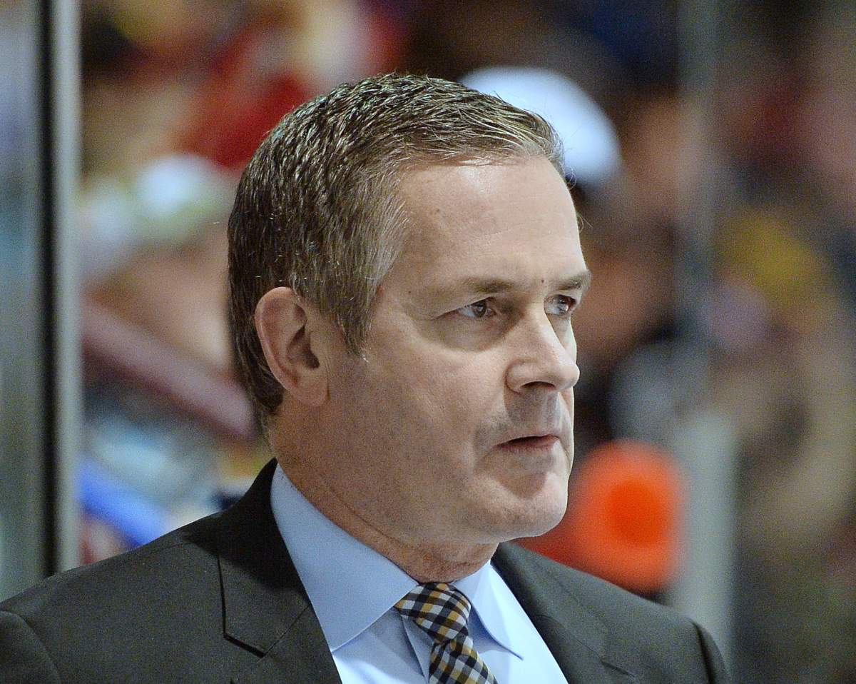 Jeff Twohey behind the Oshawa Generals bench during the 2013-14 OHL season.