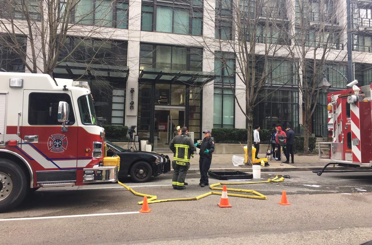 Vancouver fire crews, hazmat and police descend on a downtown apartment building as police execute a search warrant connected to a drug investigation on Feb. 16, 2020.
