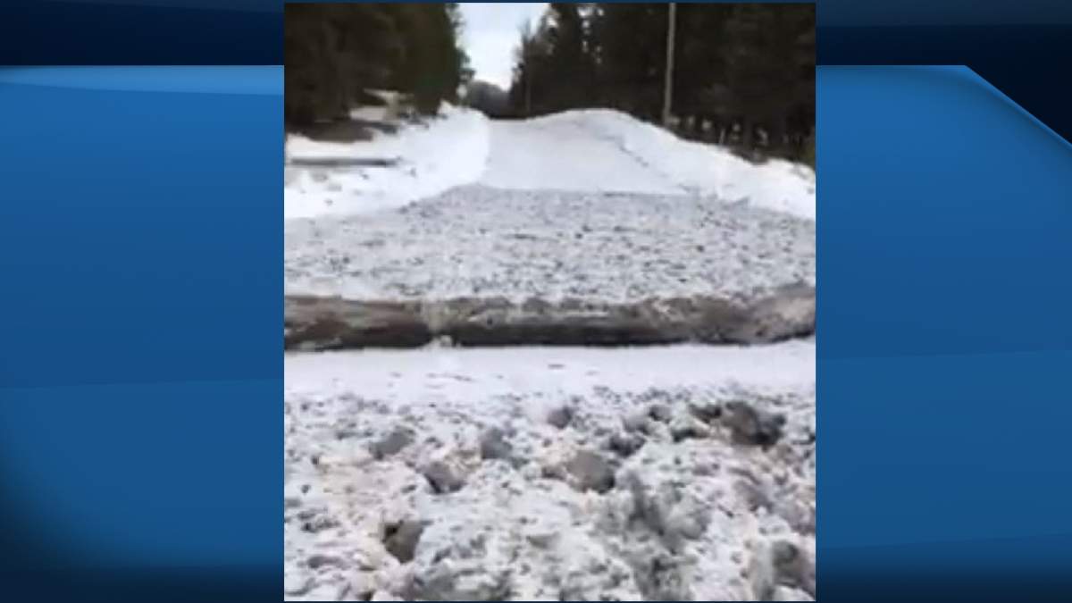 Debris covers Thynne Bridge near Tulameen, B.C., blocking traffic along Coalmont Road. 
