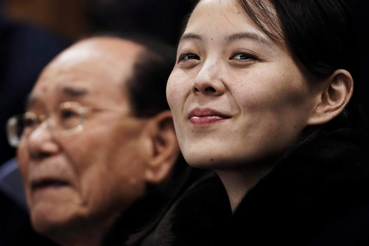 Kim Yo Jong waits with North Korea's nominal head of state, Kim Yong Nam, for the start of a women's hockey game between Switzerland and the combined Koreas at the 2018 Winter Olympics in Gangneung, South Korea, on Feb. 10, 2018.