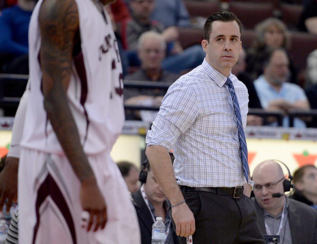 uOttawa Gee-Gees head coach James Derouin watches play at the CIS Basketball Final 8 semi-finals between the Gee-Gees and the University of Victoria Vikes in Ottawa on Saturday, March 8, 2014. Even though coach Derouin and the University of Ottawa had a guaranteed spot in the U Sports national basketball championship, he didn't let his team rest on their laurels this season.