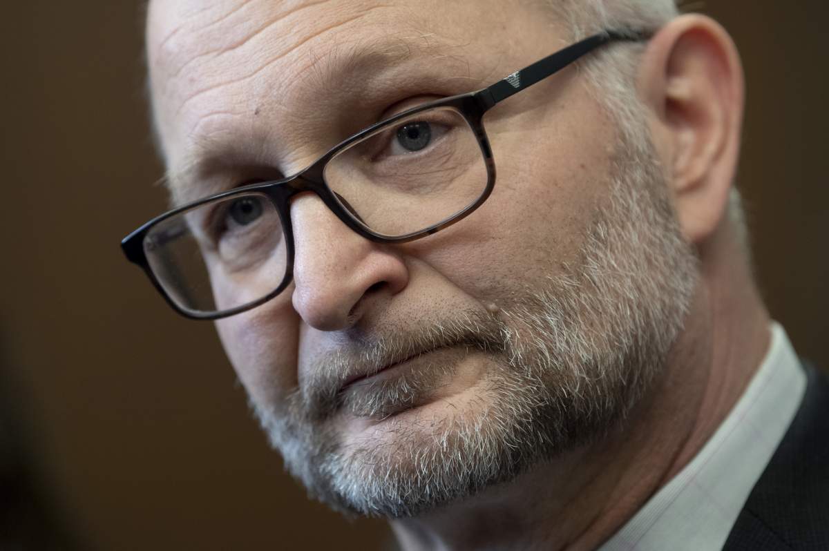 Minister of Justice and Attorney General of Canada David Lametti speaks with the media following party caucus in Ottawa, Jan. 28, 2020.