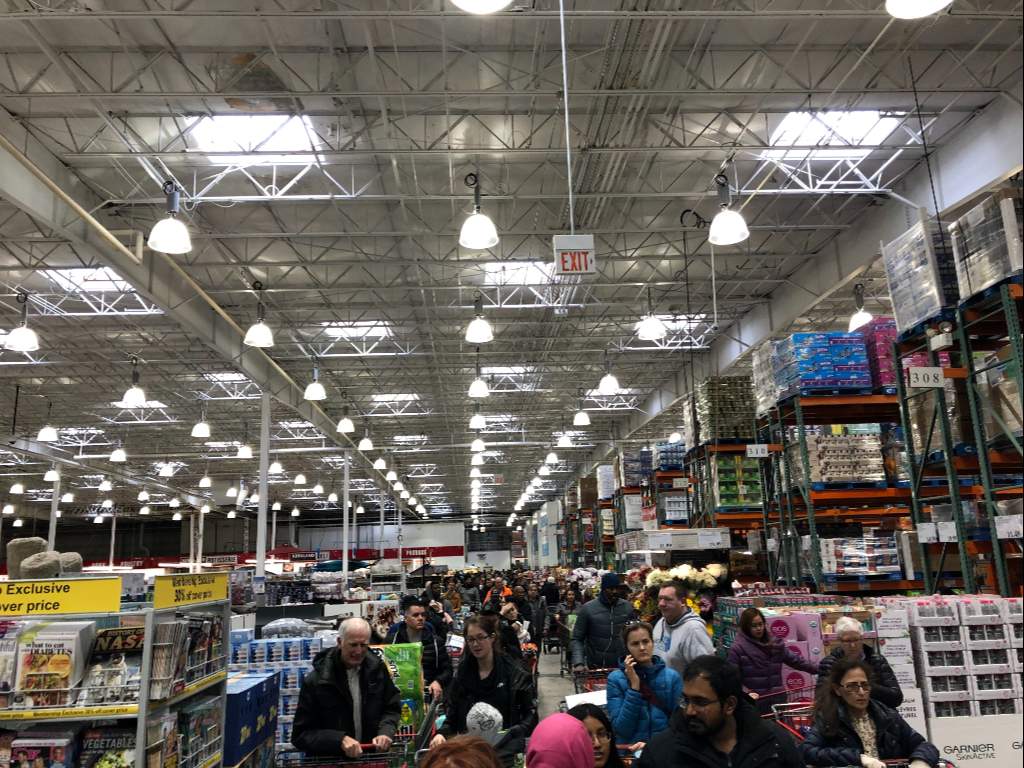 A Costco location in Ajax, Ont., was full of customers, with lines stretching almost the entire length of the store.