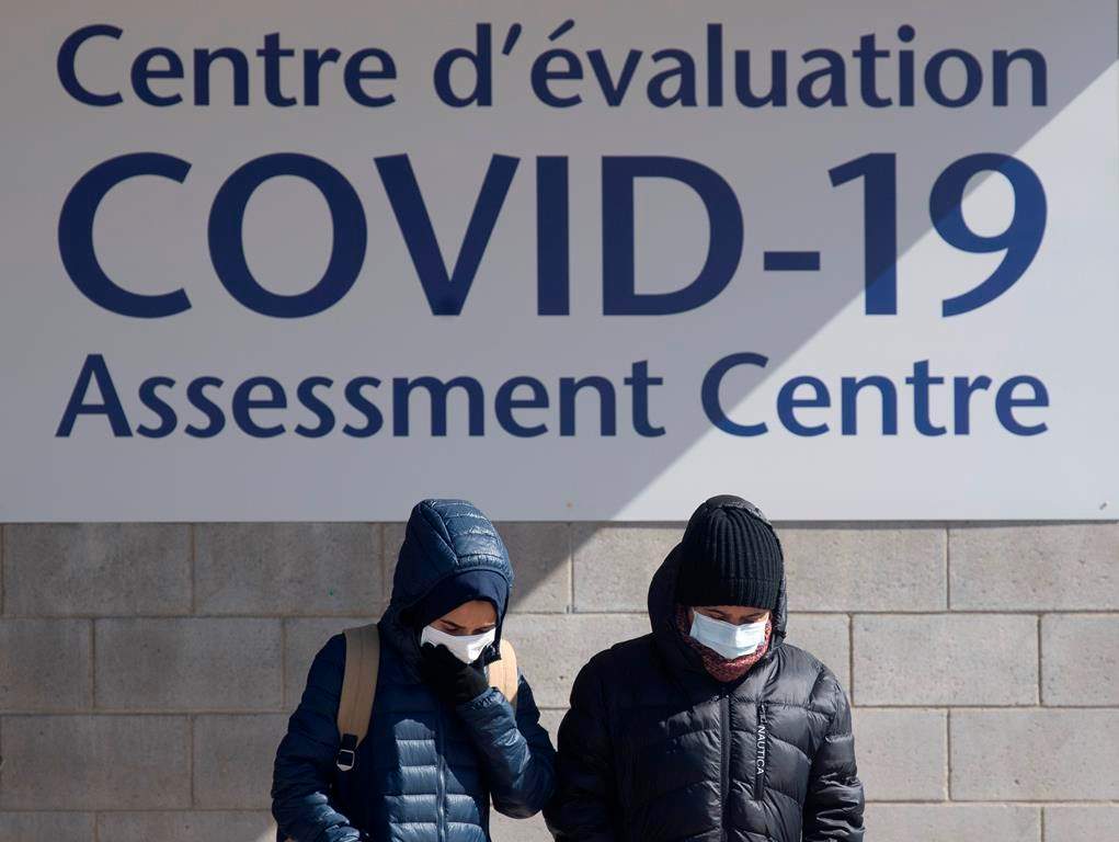 People leave a COVID-19 assessment centre on Saturday, March 14, 2020 in Ottawa.