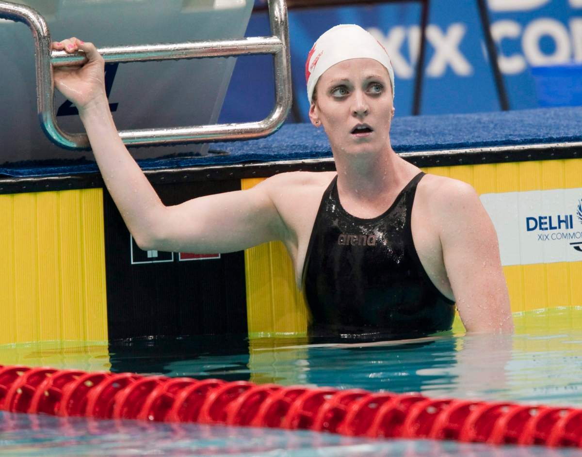 Canada’s Annamay Pierse looks at her time after the women’s 200-metre breaststroke swim final Wednesday, October 6, 2010.