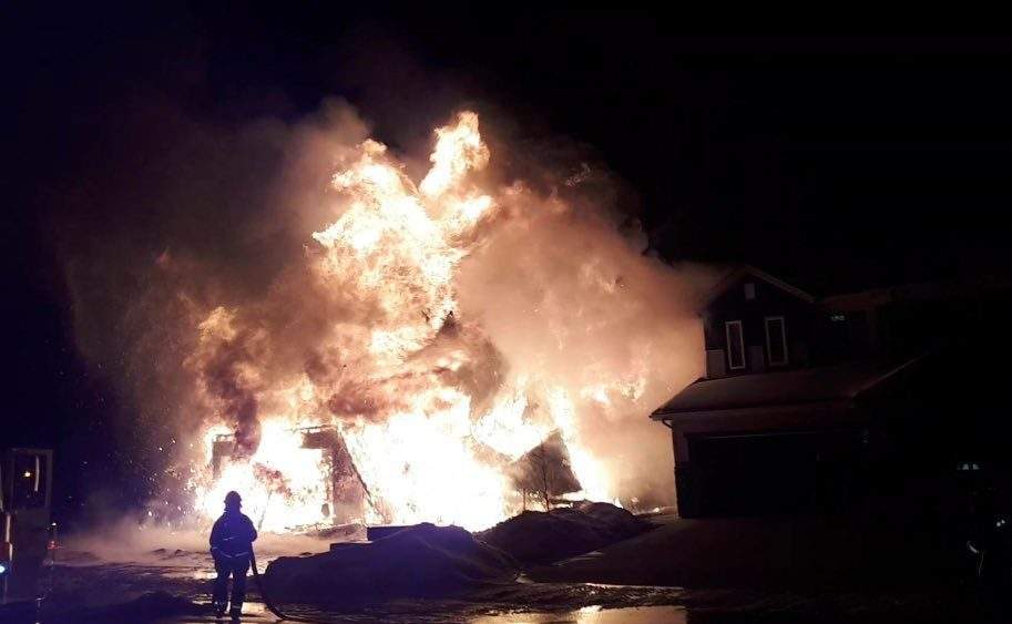 A home being built in Beaumont’s Dansereau neighbourhood going up in flames Monday, March 2, 2020.