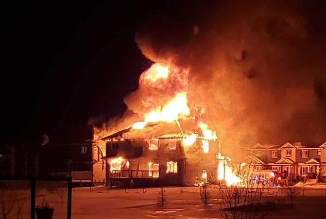 A home being built in Beaumont’s Dansereau neighbourhood going up in flames Monday, March 2, 2020.