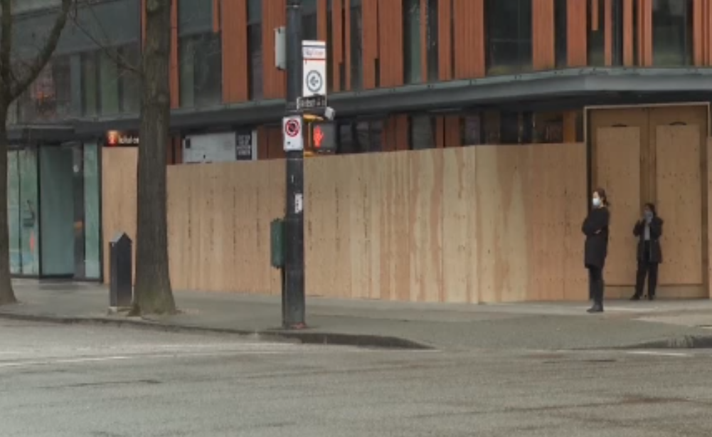 Boarded-up shops seen on Vancouver's Robson Street.