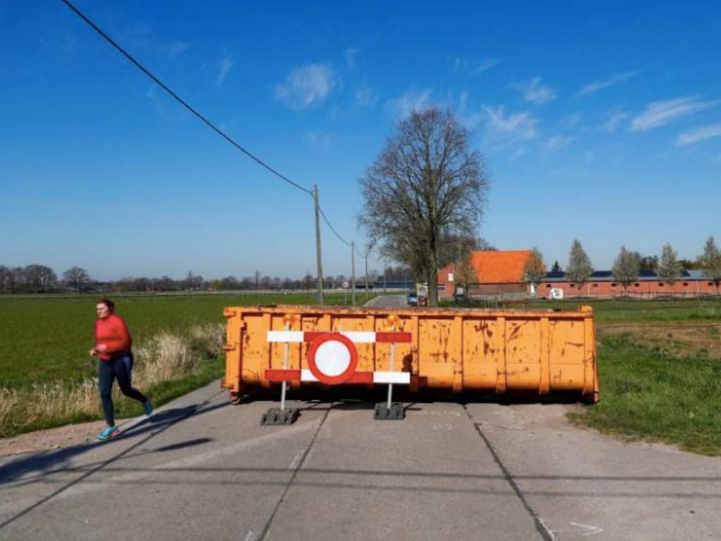 A container is pictured in a street on the Dutch-Belgian border during the coronavirus lockdown imposed by the Belgian government in an attempt to slow down the coronavirus disease (COVID-19) spread, near Hoogstraten, Belgium March 25, 2020.
