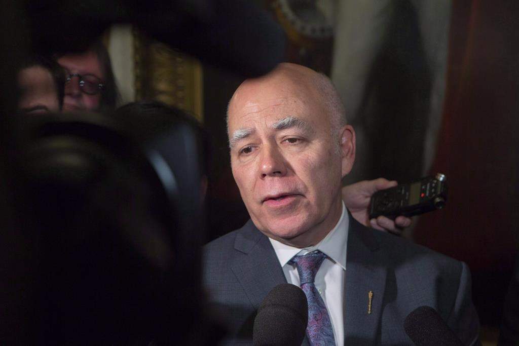 Green Party of New Brunswick Leader David Coon speaks to the media following the Throne Speech at the New Brunswick Legislature in Fredericton on Tuesday, Oct. 23, 2018. New Brunswick's Green leader has completed a provincial tour and says people want next week's provincial budget to have integrity and compassion.THE CANADIAN PRESS/James West.