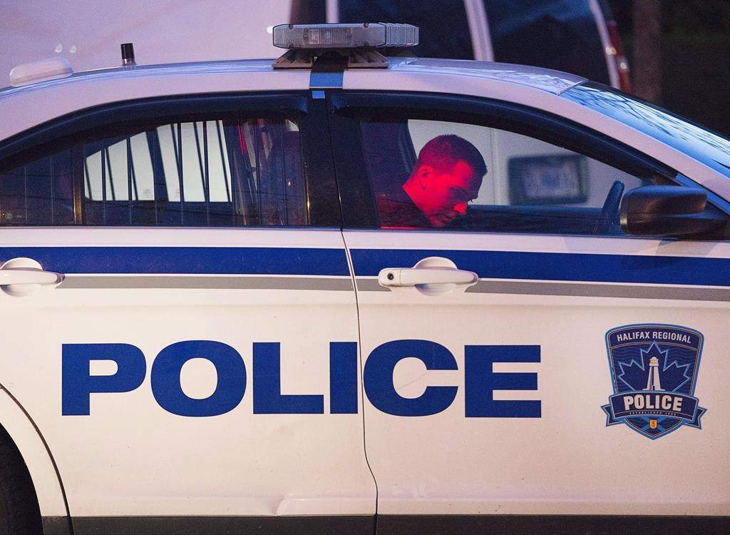 Halifax Regional Police attend a crime scene in north end Halifax on Tuesday, May 17, 2016.