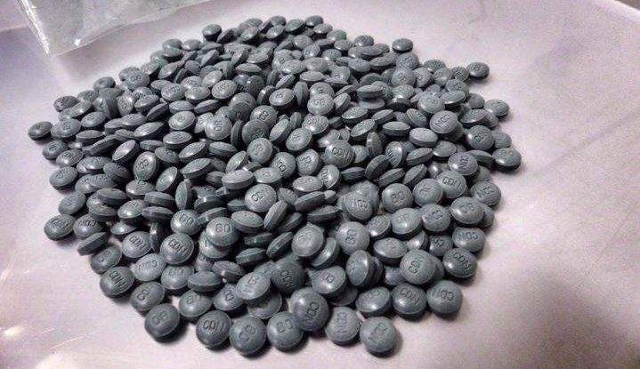 Fentanyl pills are shown in an undated police handout photo