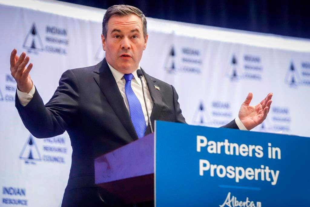 File: Alberta Premier Jason Kenney delivers remarks at a conference in Calgary on February 26, 2020.
