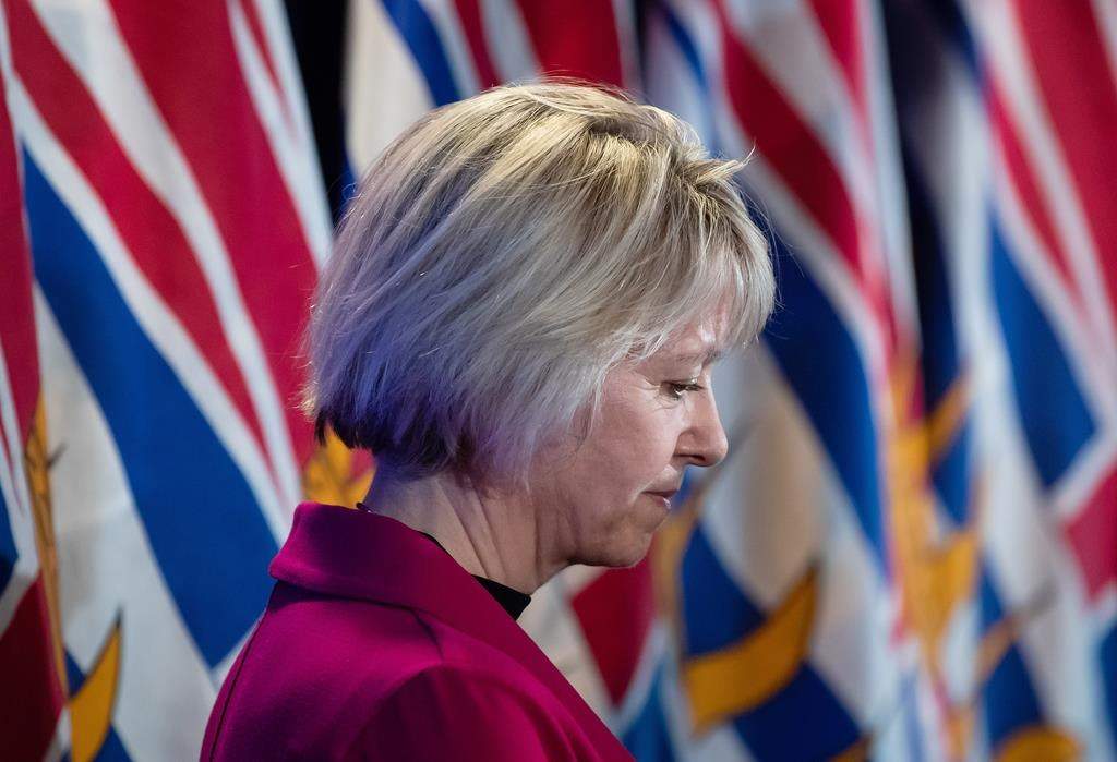Provincial health officer Dr. Bonnie Henry listens during a news conference about the provincial response to the coronavirus, in Vancouver on Friday, March 6, 2020. Henry says the women’s curling world championship in Prince George will go ahead as planned starting Saturday. THE CANADIAN PRESS/Darryl Dyck
