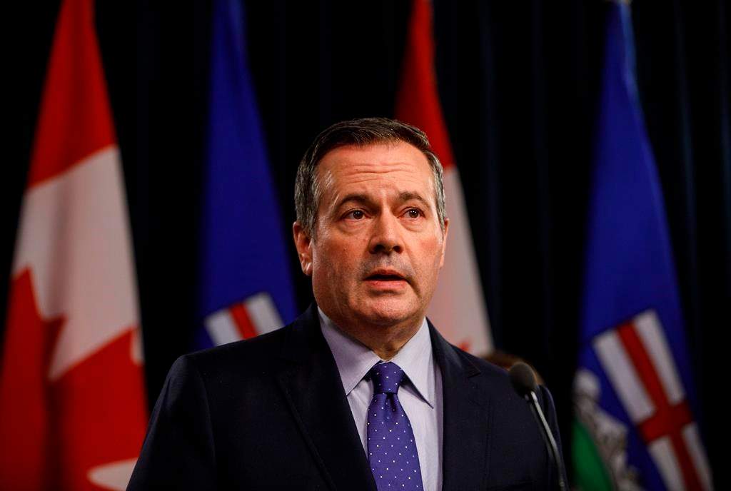 Alberta Premier Jason Kenney updates media on measures taken to help with COVID-19, in Edmonton on Friday, March 20, 2020. THE CANADIAN PRESS/Jason Franson.