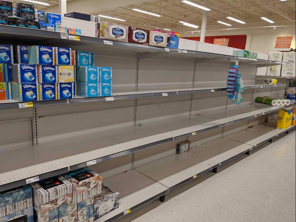 Water and toilet paper shelves are barren in one Guelph, Ont., grocery store.