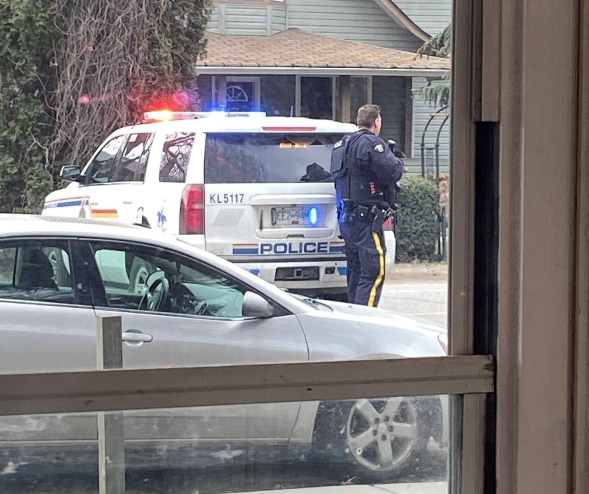 Police descend on a Cadder Ave. home after reports of shots fired. 