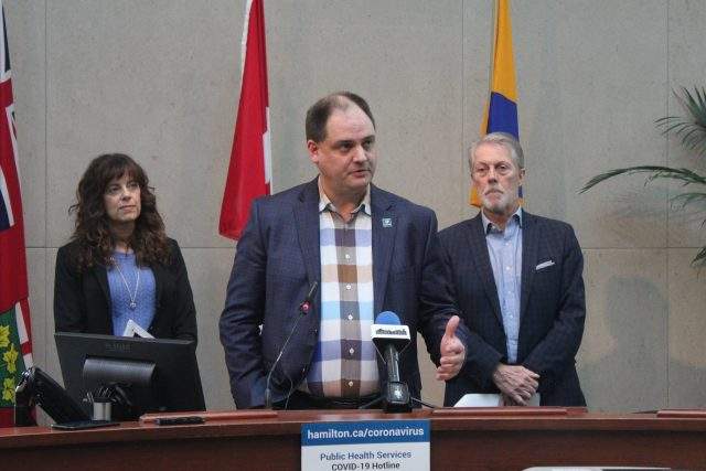 Hamilton's EOC director, Paul Johnson, mayor Fred Eisenberger and Dr. Elizabeth Richardson during a March 2020 press conference on COVID-19. 