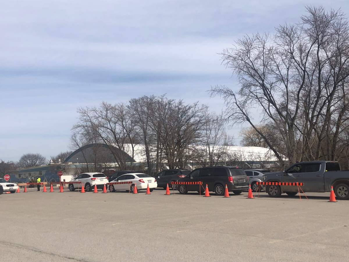 Cars line up outside Oakridge Arena on Monday morning to access London's COVID-19 assessment centre. 