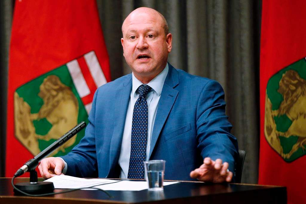 Dr. Brent Roussin, Manitoba chief public health officer, speaks during the province's latest COVID-19 update at the Manitoba legislature in Winnipeg Monday, March 23, 2020. THE CANADIAN PRESS/John Woods.