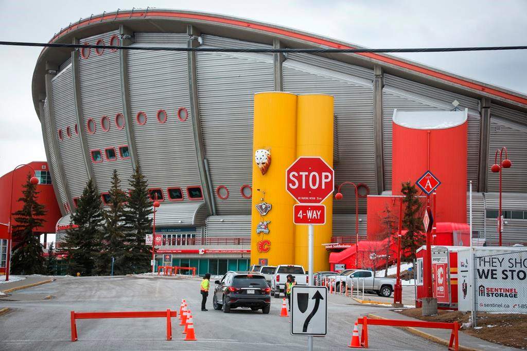 The Saddledome, home of the Calgary Flames, is seen in Calgary, Thursday, March 12, 2020.