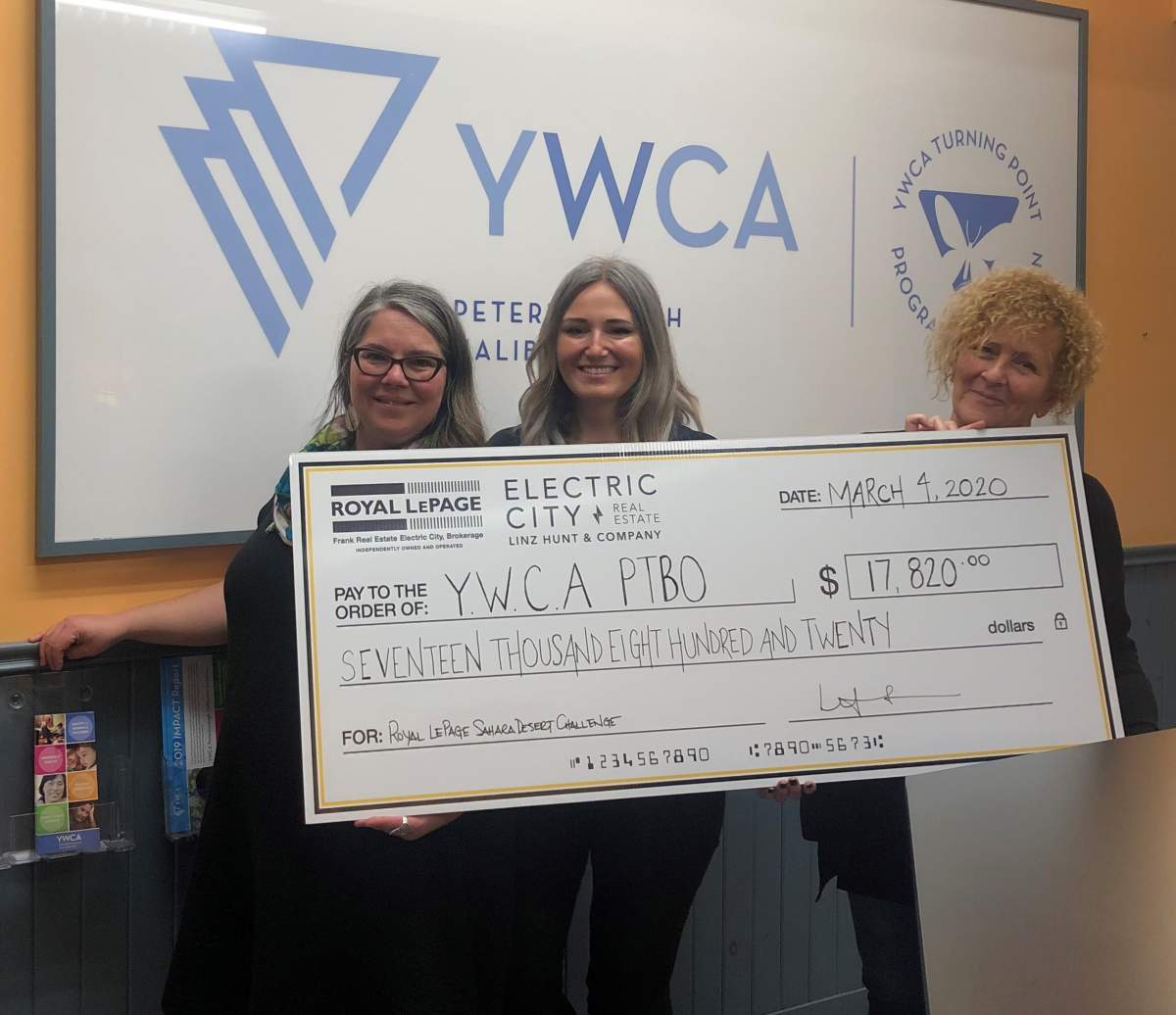 Realtor Linz Hunter presented more than $17,000 to the YWCA Crossroads Shelter in Peterborough from her trek in the Sahara Desert.
