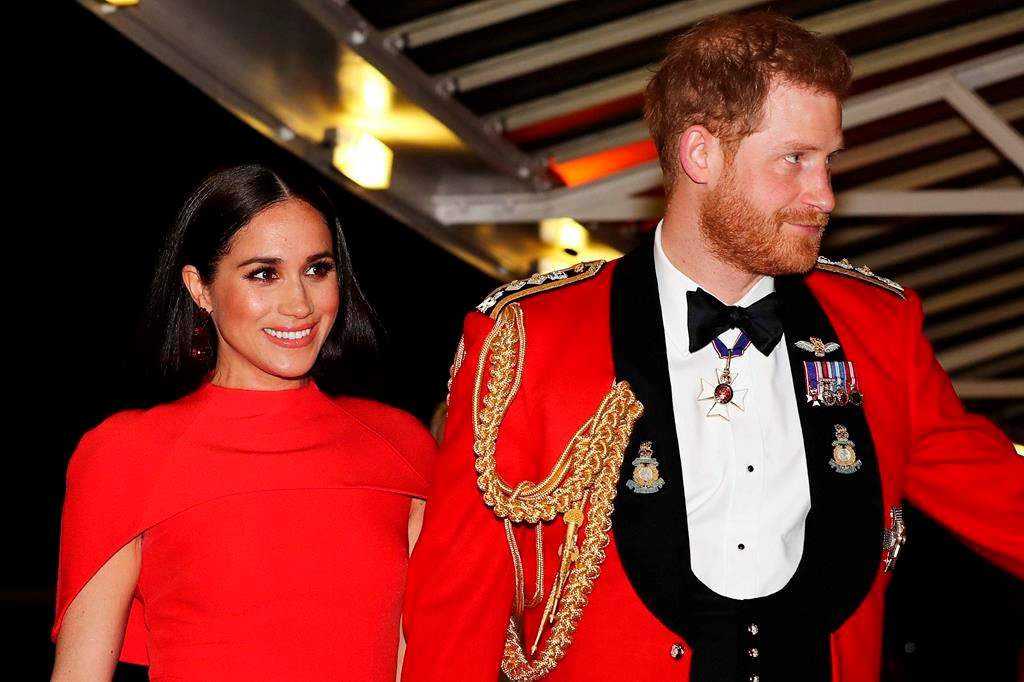 Britain’s Prince Harry and Meghan, Duchess of Sussex arrive at the Royal Albert Hall in London, Saturday, March 7, 2020, to attend the Mountbatten Festival of Music. (Simon Dawson/Pool via AP)