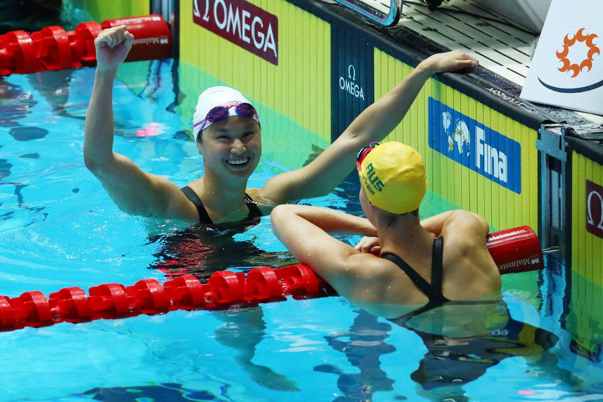 Gold medalist Margaret MacNeil of Canada celebrates in the Women's 100m Butterfly Final on day two of the Gwangju 2019 FINA World Championships at Nambu International Aquatics Centre on July 22, 2019 in Gwangju, South Korea.
