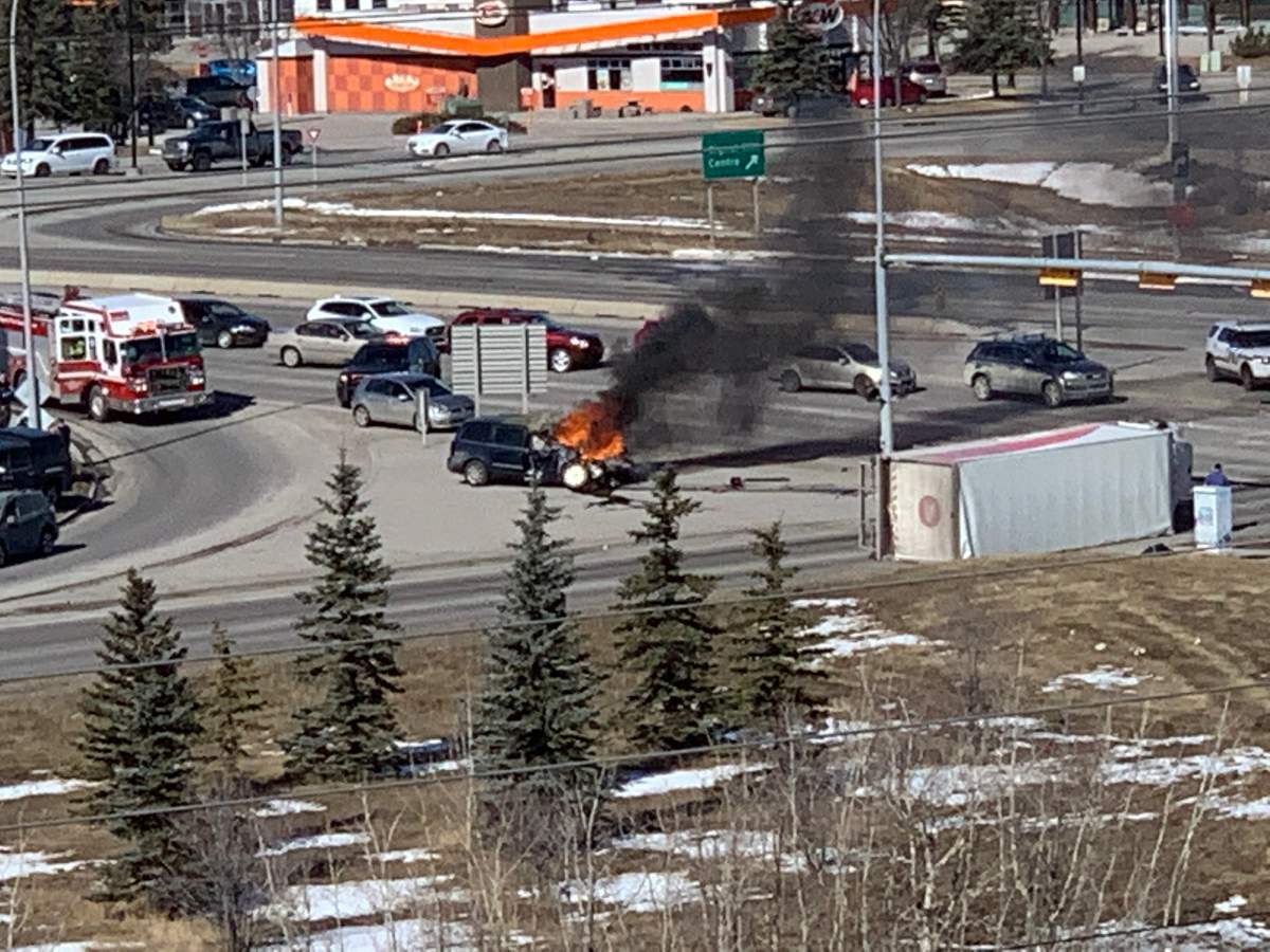 A man was seriously injured in a crash between a postal truck and a minivan in Calgary's southwest. 
