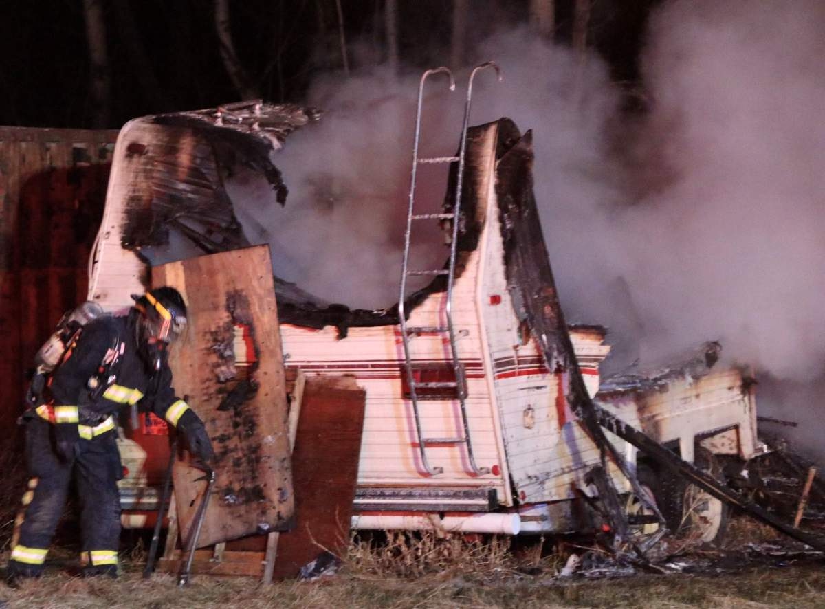 A fire destroyed an RV on Old Okanagan Highway Tuesday morning.