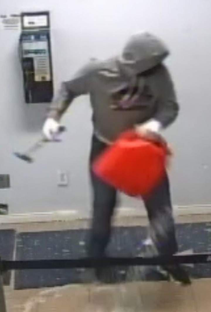 Toronto police have released photos of two male suspects wanted in an arson investigation at East Collision Reporting Centre in Scarborough.