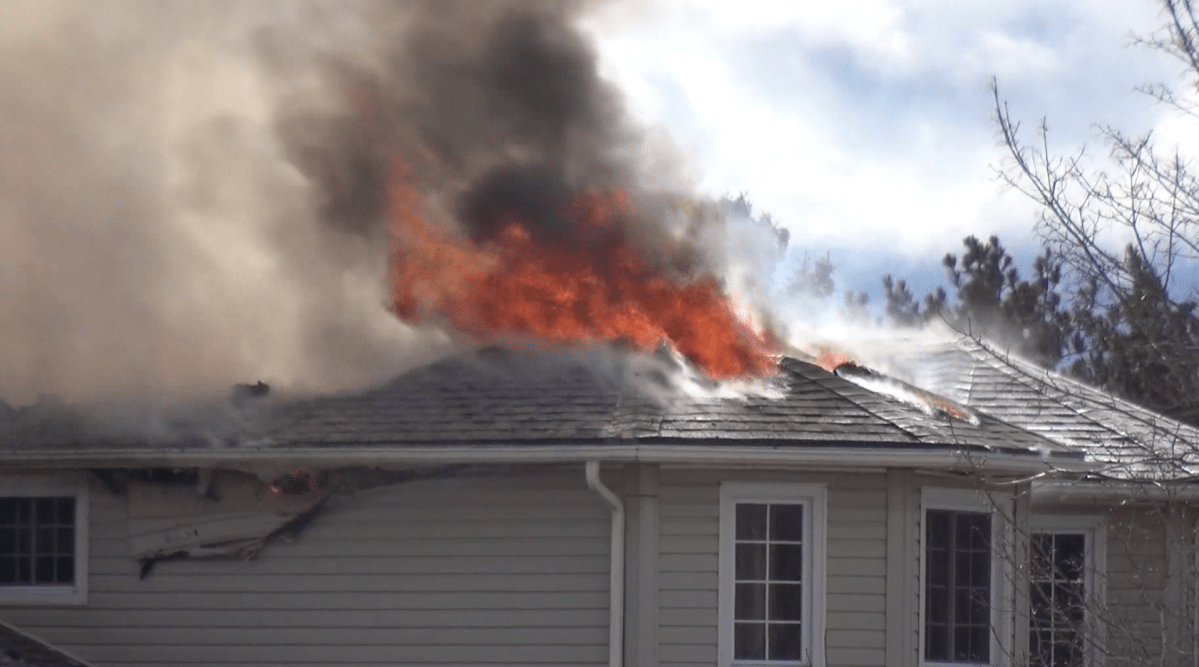 Selwyn Township fire-fighters battle a house fire on Brick Road in Ennismore on Friday morning.