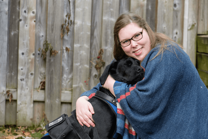 Sinead Zalitach pictured here with her service dog. Photo by Kristina Laukkanen