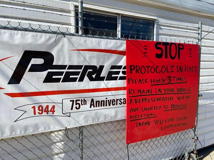 The company says health protocols that were put into place on Sunday prevented the employee from coming into work after returning from vacation.
