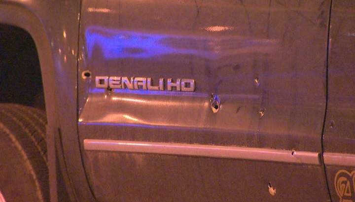 A tow truck can be seen near North York General Hospital with multiple bullet holes.