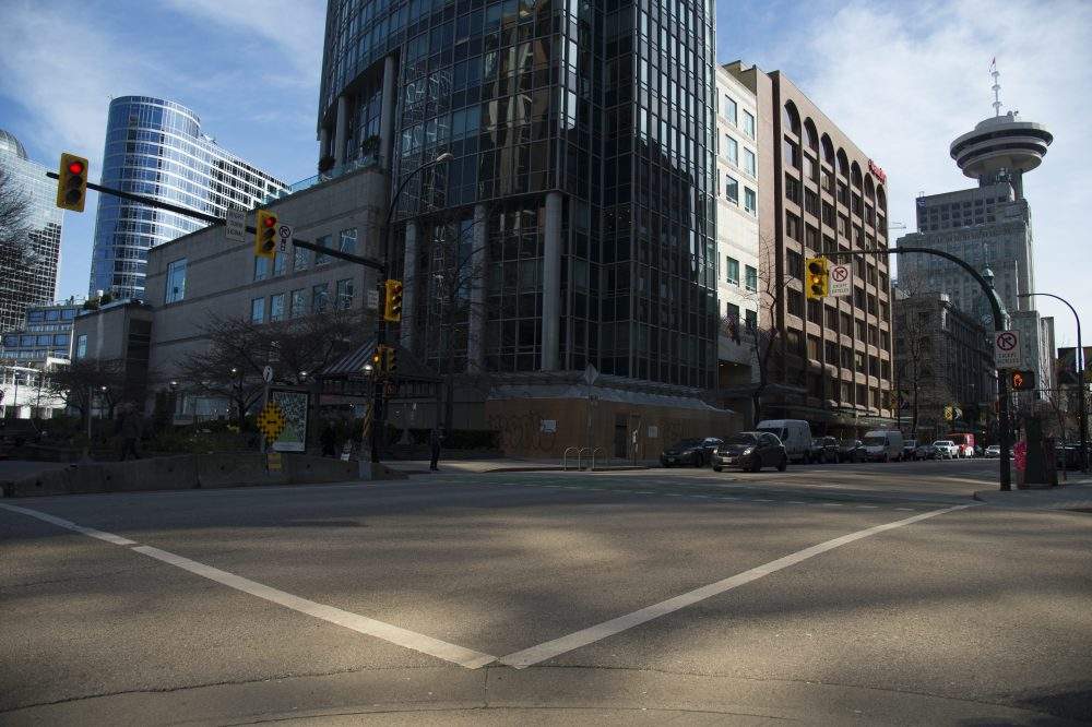 The empty streets are seen in downtown Vancouver on Tuesday, March 17, 2020.