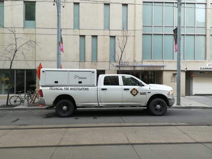 Fire investigators at 220 Victoria Street Saturday morning.
