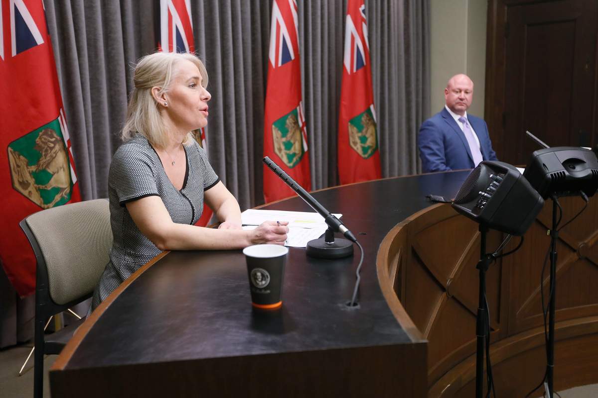 Dr. Brent Roussin, Manitoba chief public health officer, and Lanette Siragusa, provincial lead, health system integration, quality/chief nursing officer for Shared Health, speak during the province's latest COVID-19 update at the Manitoba legislature in Winnipeg Thursday, March 26, 2020. 