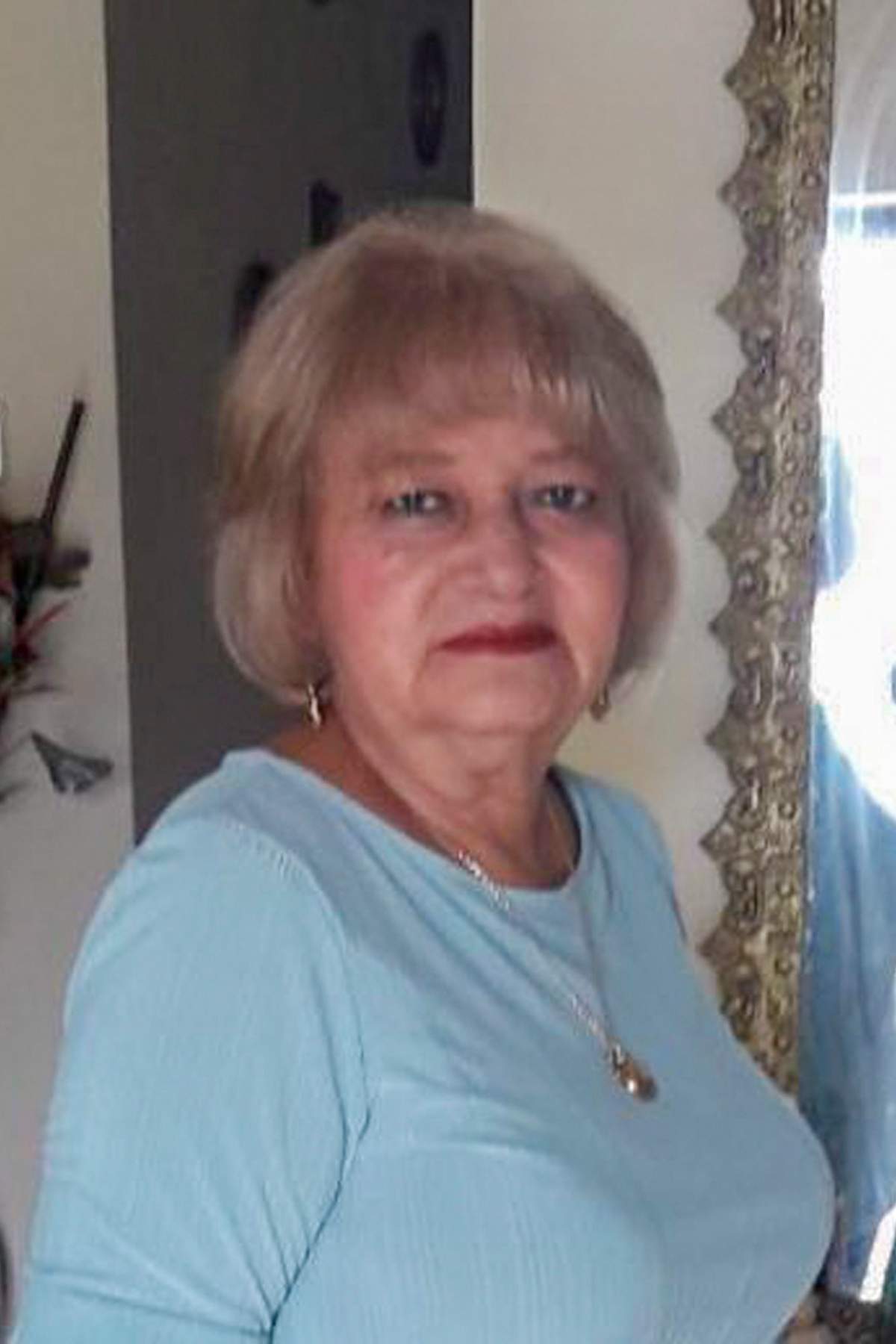 This 2019 photo provided by the Lamilla Family shows Bella Lamilla, a retired school teacher who was Ecuador’s first confirmed coronavirus case. Even as Ecuador’s coronavirus patient zero agonized in intensive care, strangers began tearing her reputation apart online.