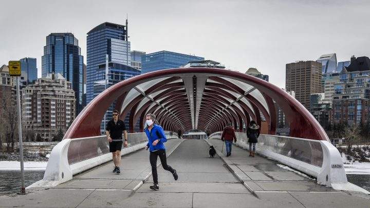 People practice physical distancing in Calgary, Alta., Thursday, April 9, 2020, amid a worldwide COVID-19 pandemic.