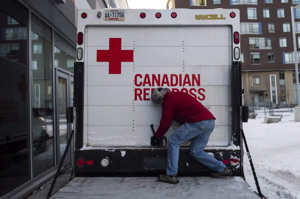 FILE: The Canadian Red Cross checks the contents of an emergency shelter unit.