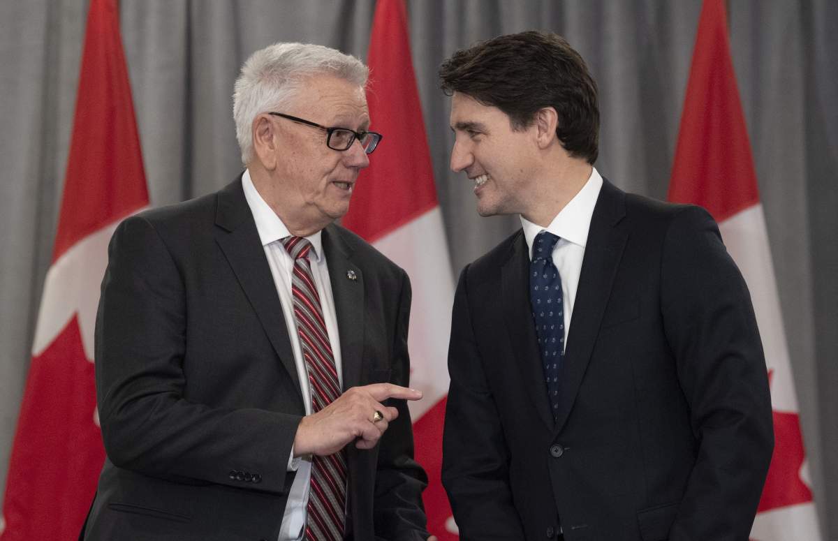 Prime Minister Justin Trudeau and FCM president Bill Karsten speak before a meeting with the Federation of Canadian Municipalities in Ottawa on Nov. 28, 2019.