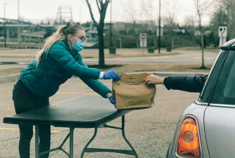 YYCFoodTrucks host a drive-thru event for Calgarians amid the COVID-19 pandemic