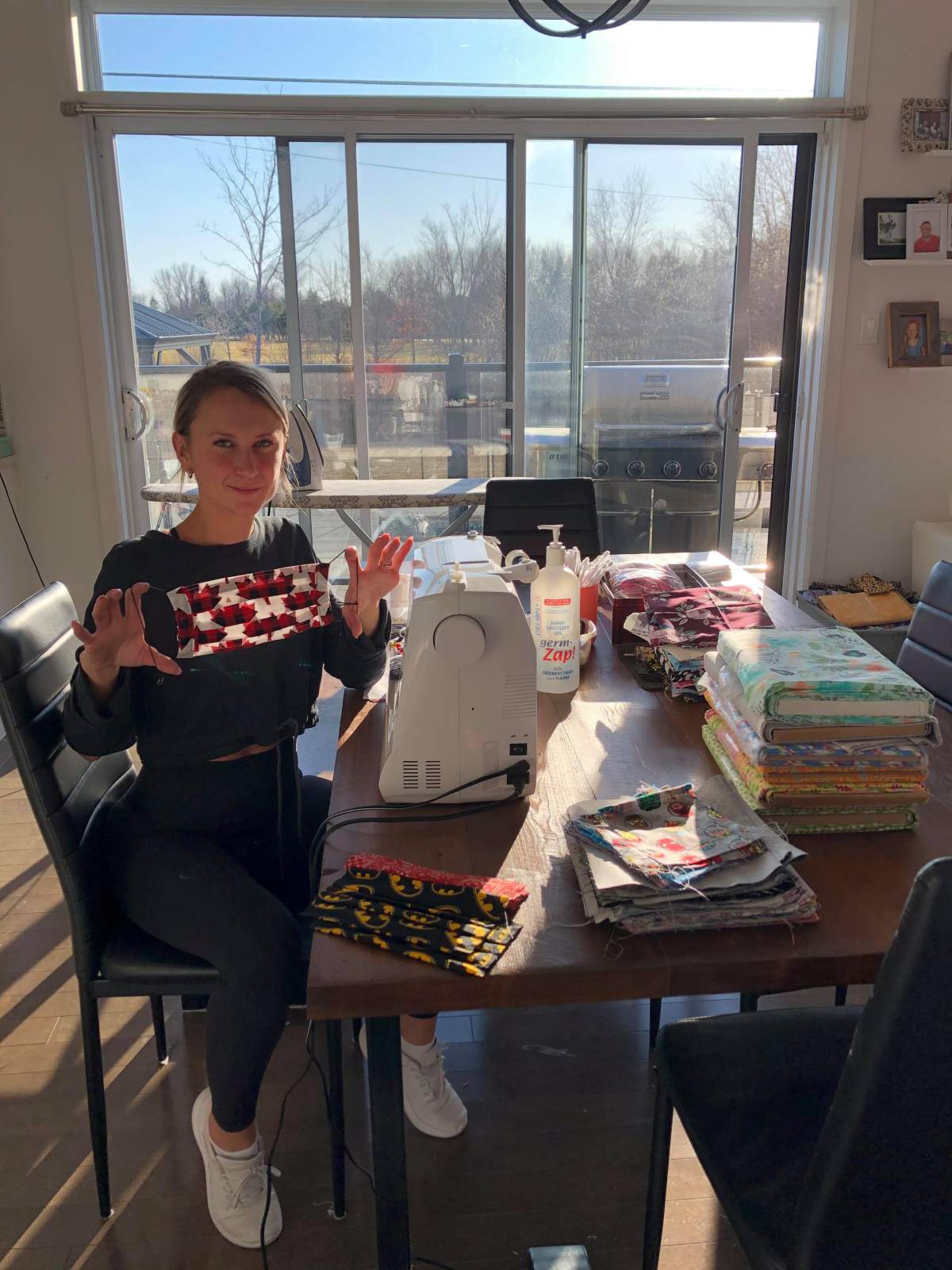 Sophia Johnson put her hand-made bow business aside and is now making fabric face masks at home. Thursday April 2, 2020.