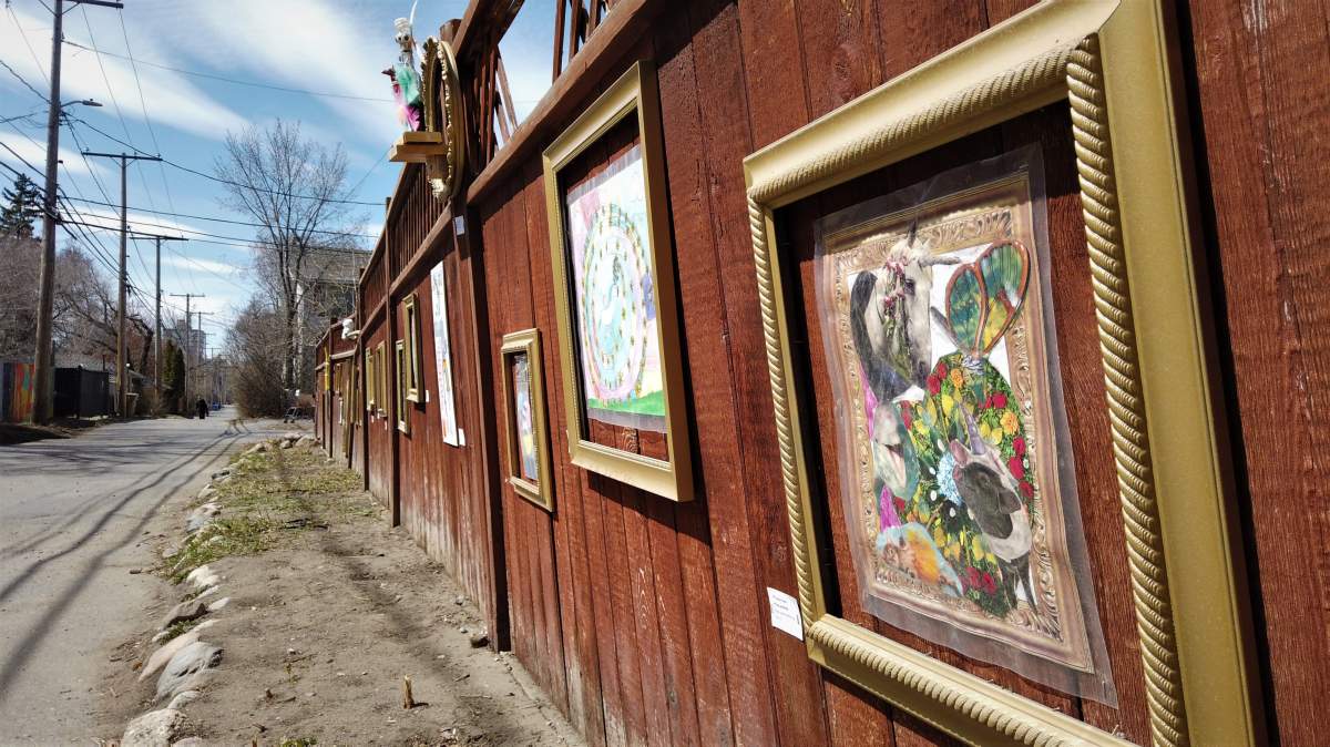Artwork by children in Regina's Heritage neighbourhood is proudly displayed in the 'Alley Galley,' created by Heather Cameron.