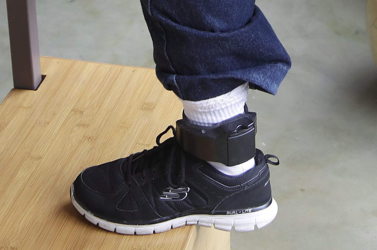 A man is shown wearing an ankle bracelet in this Tuesday, Oct. 23, 2018 file photo.