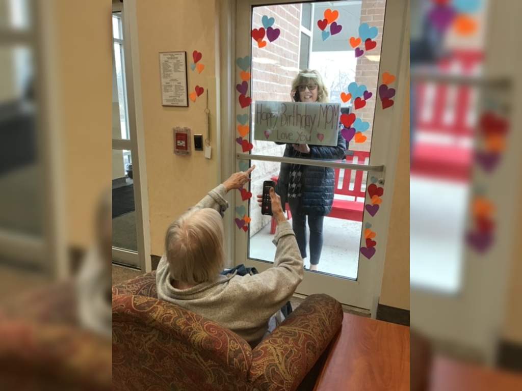 The staff at the Sienna Senior Living residence in Bobcaygeon, Ont. created a space for families to come see their loved ones through the glass.