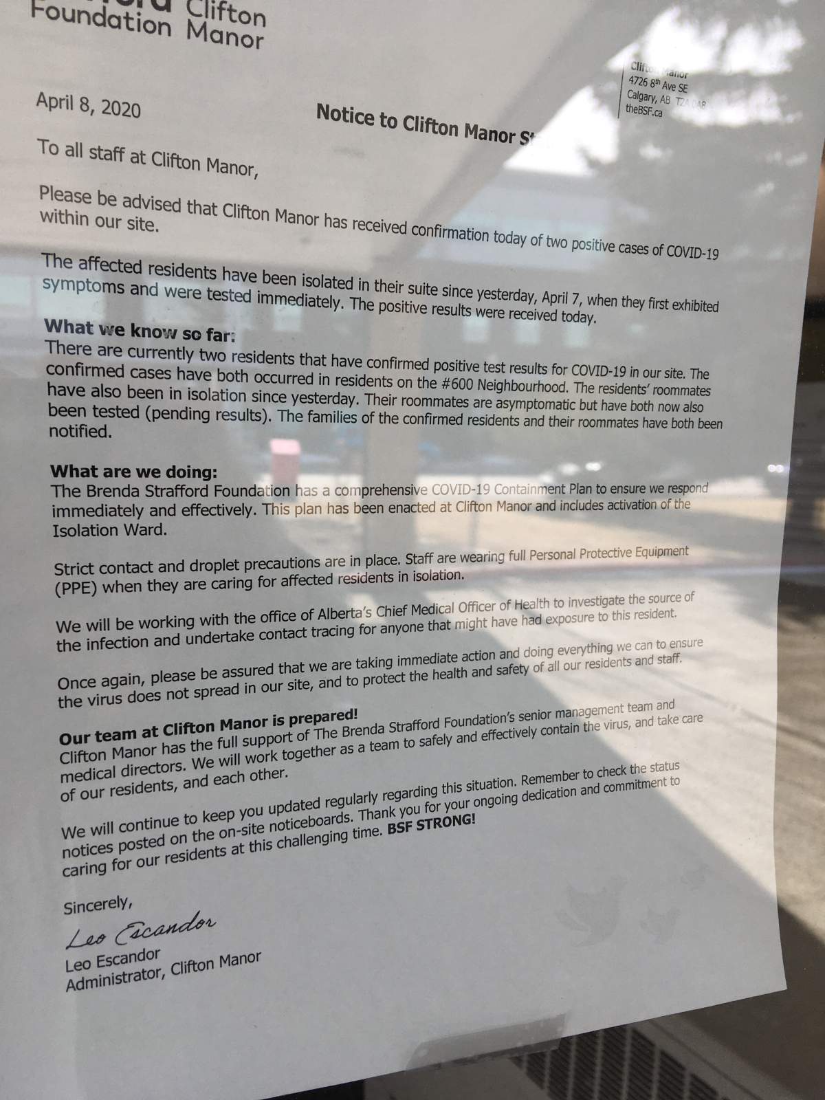 A notice on the door advising staff at Clifton Manor