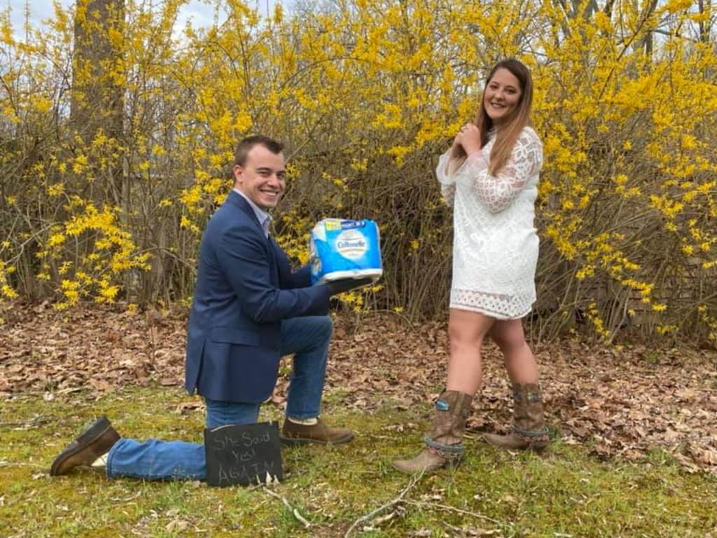 One of their engagement photoshoot props was a pack of toilet paper, one of the many essential items that sold out for weeks across the country.