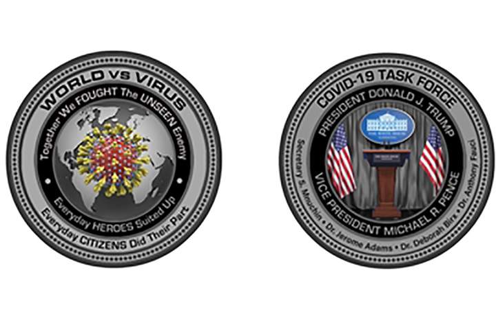 A commemorative coin marking the COVID-19 pandemic is shown in this photo from the White House gift shop.